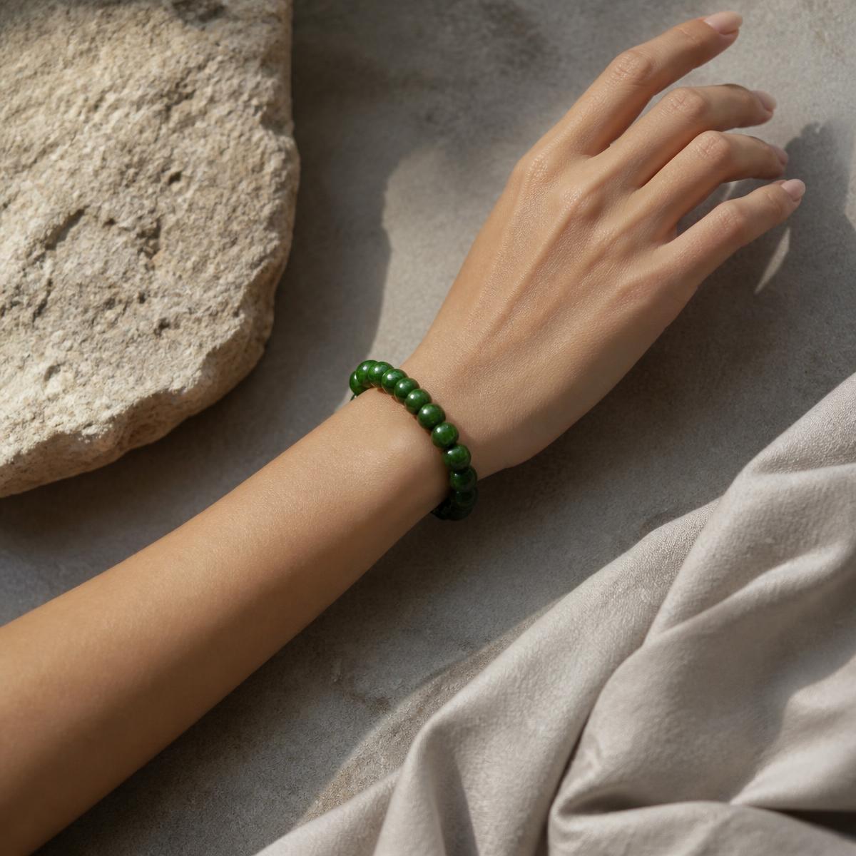 Guatemalan jade beaded bracelet worn on the wrist, full piece visible — delivered in Flushing, Queens